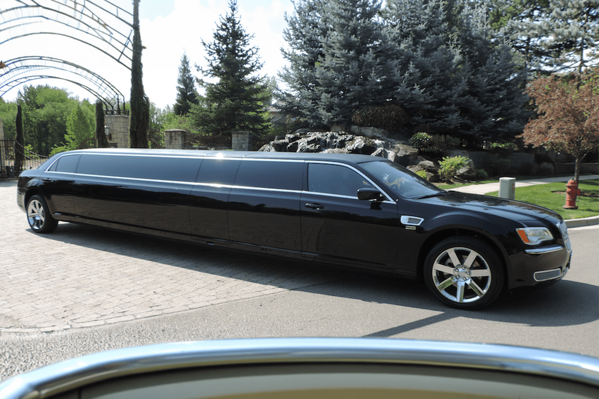 Frankfort Limo Service luxury sedan parked in a charming Frankfort neighborhood