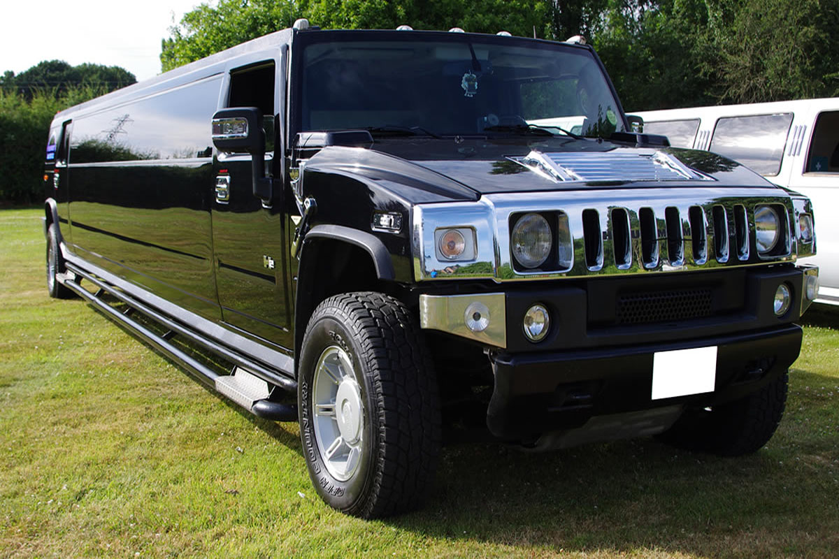 Elegant white Hummer stretch limousine available for special events with Tinley Park Limo Service.