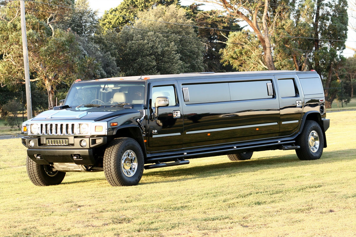 Elegant white Hummer stretch limousine available for special events with Mokena Limo Service.