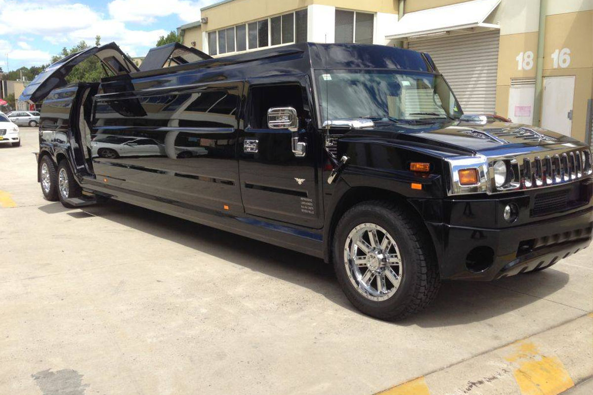 Elegant white Hummer stretch limousine available through New Lenox Limo Service.