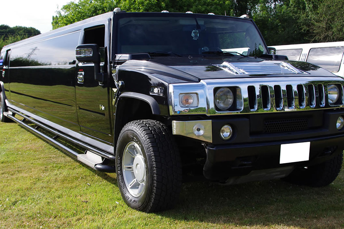Elegant white Hummer stretch limousine available through Homer Glen Limo Service.
