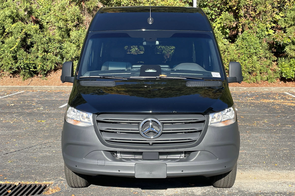 High-roof Mercedes Sprinter van providing group travel via Palos Hills Limo Service.